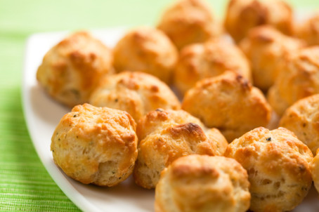 Mini Gourgeres nicely browned on a plate