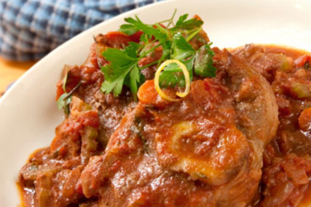 Osso Bucco prepared recipe plated and garnished with fresh parsley