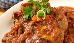 Osso Bucco plated and garnished with parsley